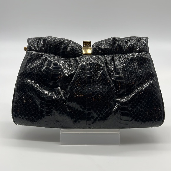 Black skin clutch with gold colored closure - Picture 2 of 4